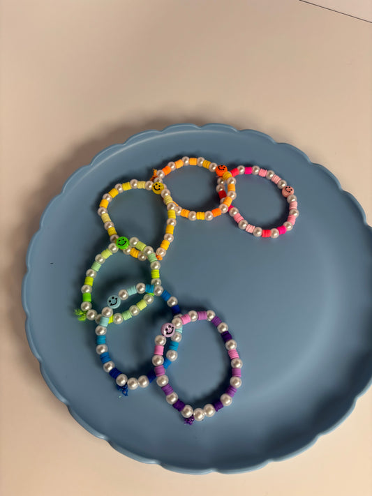 Smiley face, rainbow bracelets